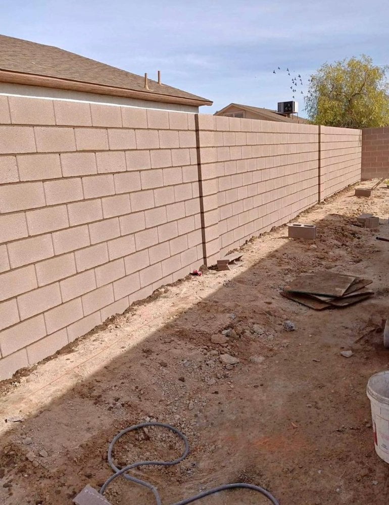 Clay colored concrete block wall installed in Phoenix by Primos Concrete Phoenix
